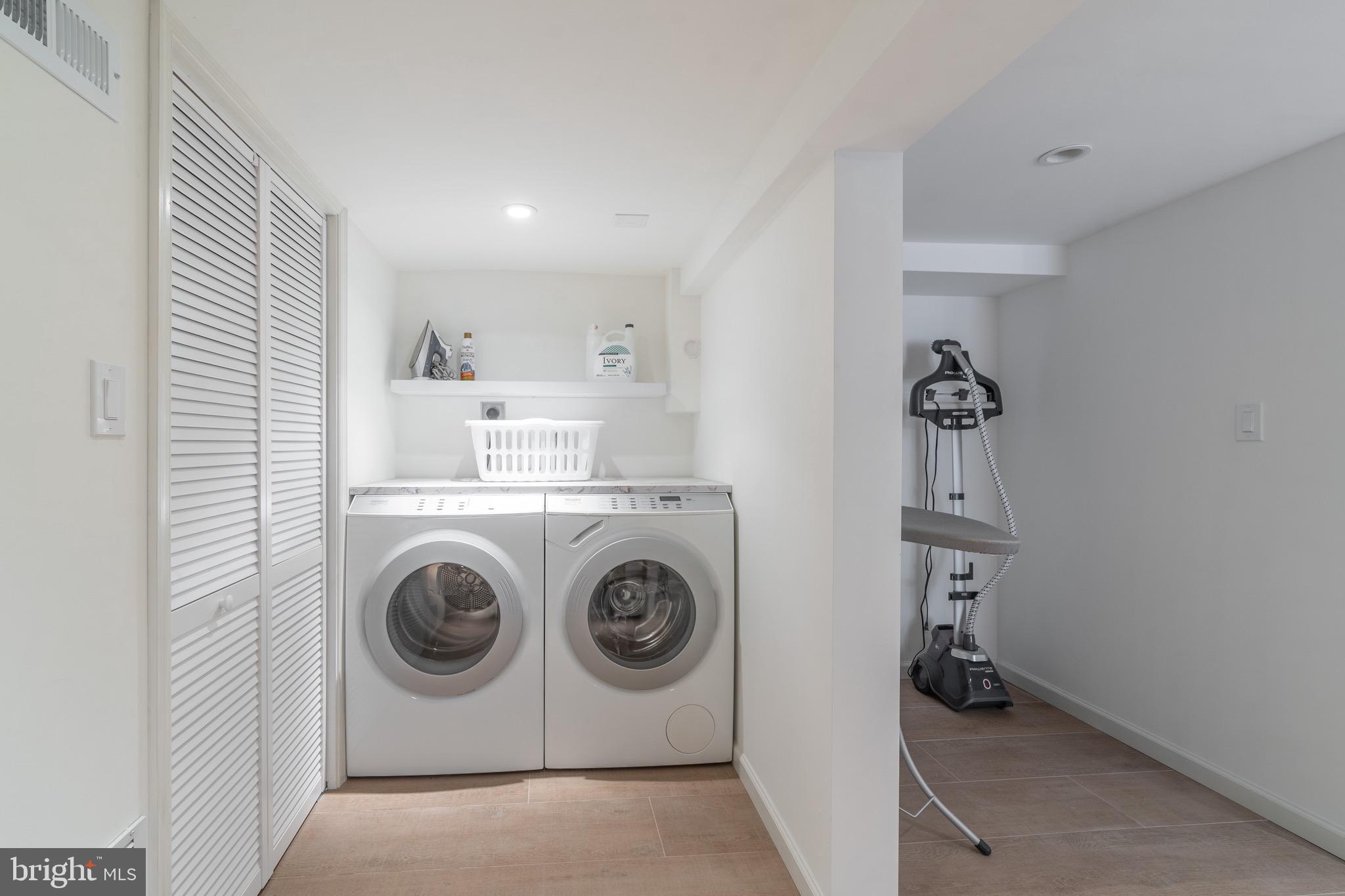 2701 36th Street Northwest Washington, DC 20007 - Photo 56 of 62 a utility room with dryer and washer