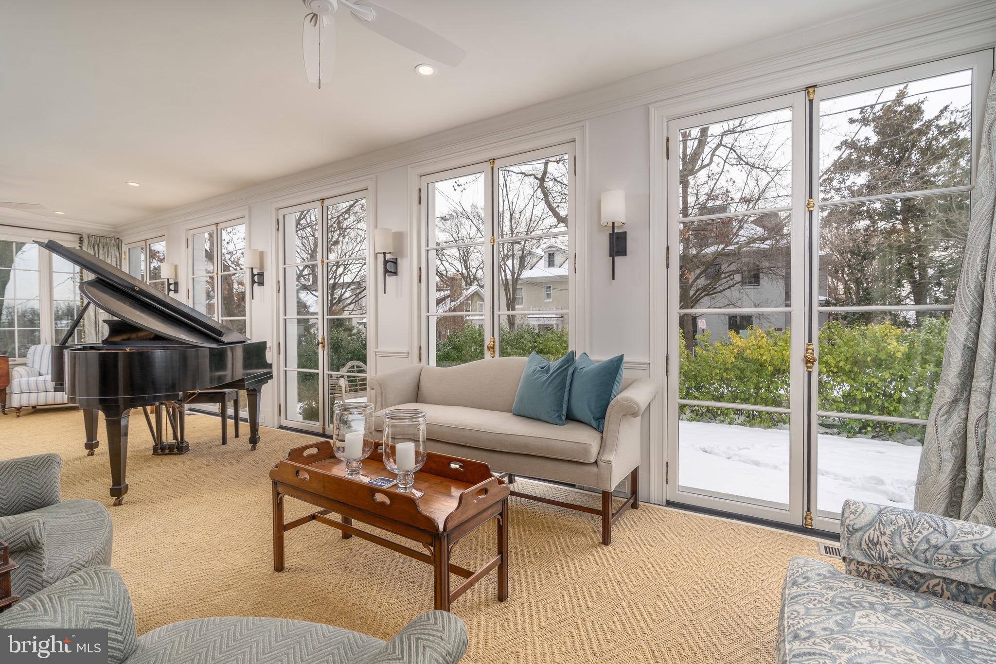 2701 36th Street Northwest Washington, DC 20007 - Photo 10 of 62 a living room with furniture and a large window