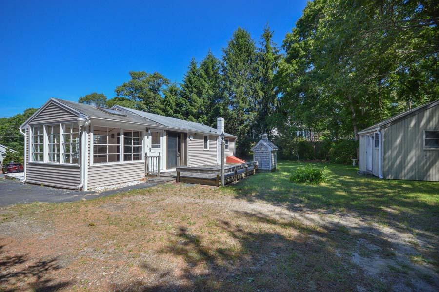 8 Treasure Lane Mashpee, MA 02649 - Photo 2 of 17 a view of a house with a yard
