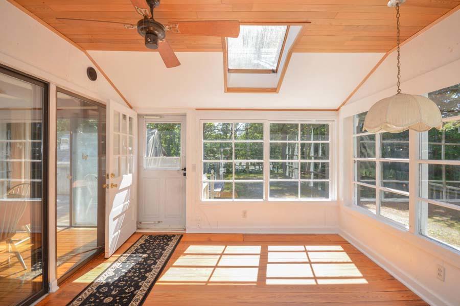 8 Treasure Lane Mashpee, MA 02649 - Photo 5 of 17 a view of a room with windows and stairs