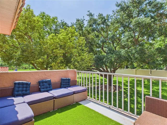a outdoor living space with furniture and garden view
