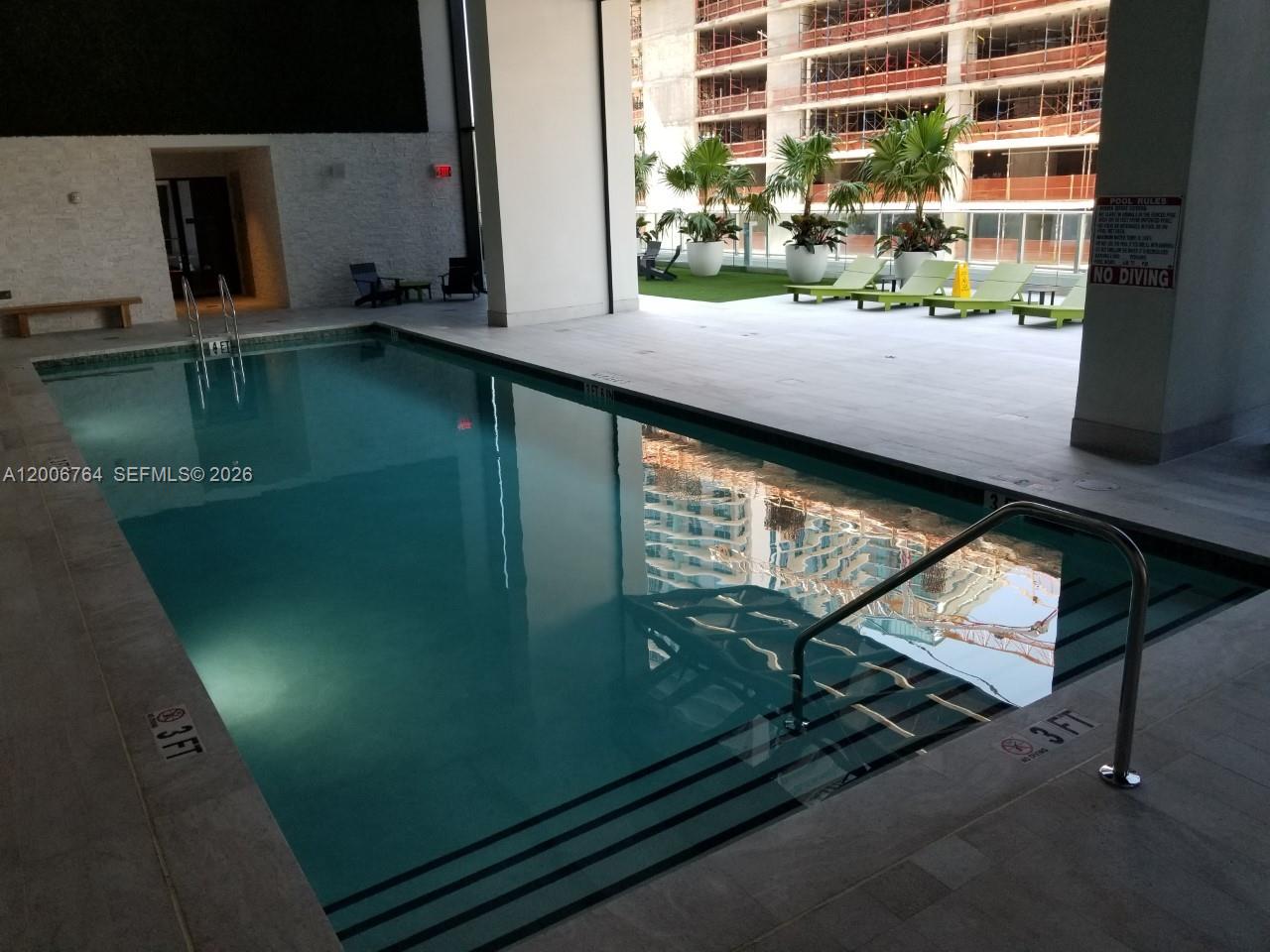 1010 Brickell Avenue, Unit 3205 Miami, FL 33131 - Photo 24 of 35 in dooor lap pool