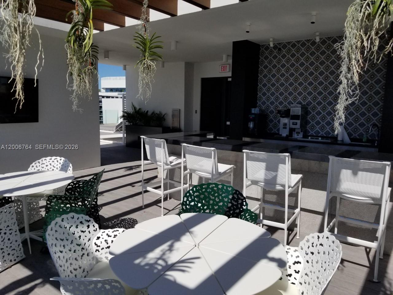 1010 Brickell Avenue, Unit 3205 Miami, FL 33131 - Photo 27 of 35 restaurant service on the pool deck