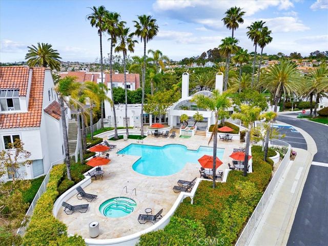an aerial view of a house swimming pool and