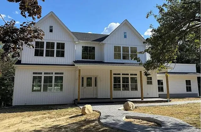 a front view of a house with windows