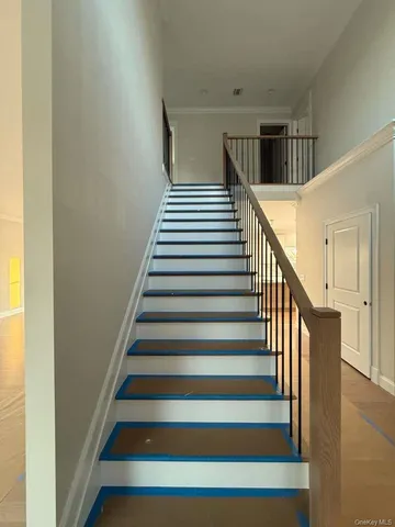 a view of hallway with stairs