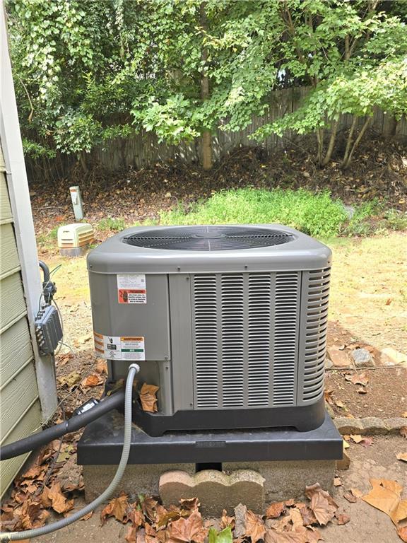 227 Quail Run Roswell, GA 30076 - Photo 13 of 20 a view of backyard with barbeque grill and plants