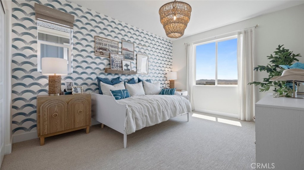 161 Scoville Irvine, CA 92618 - Photo 13 of 34 a bedroom with a bed and a potted plant