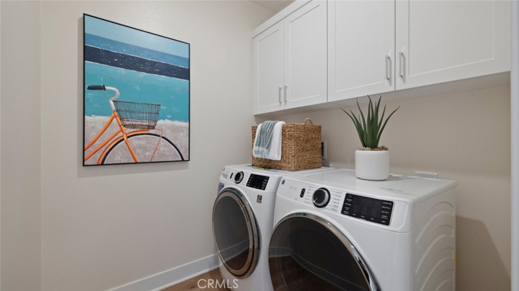 161 Scoville Irvine, CA 92618 - Photo 21 of 34 a utility room with dryer and washer