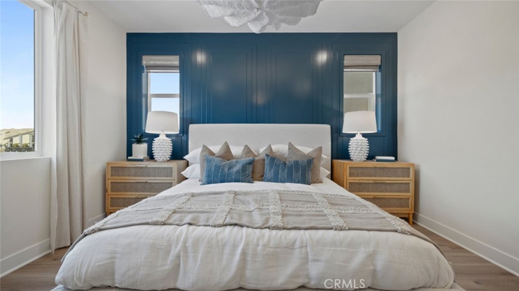 161 Scoville Irvine, CA 92618 - Photo 10 of 34 a bedroom with a bed and a mirror