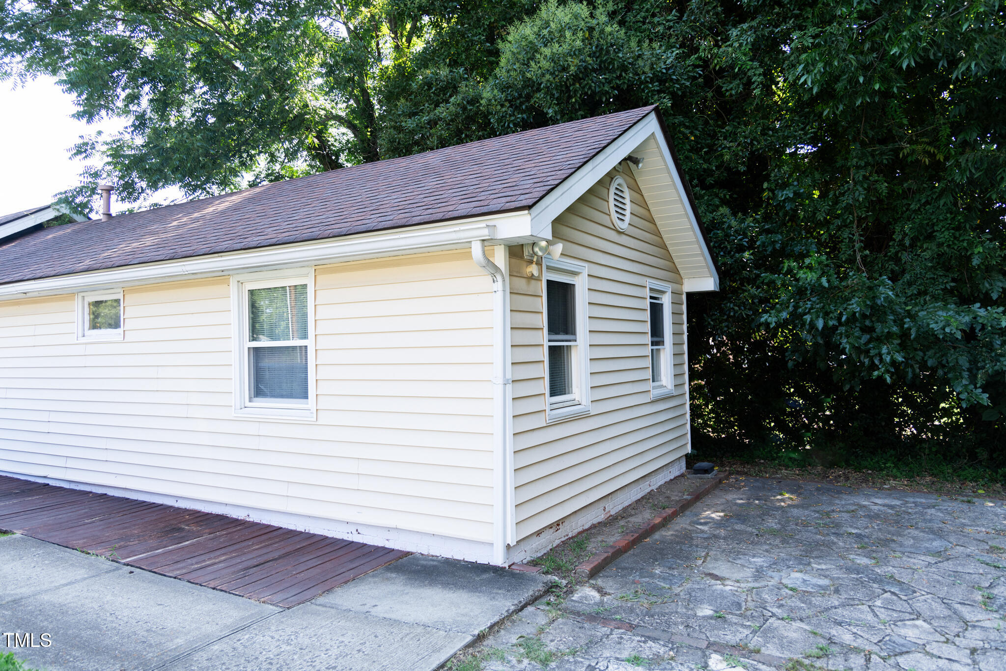 1320 Oakwood Avenue Raleigh, NC 27610 - Photo 5 of 6 a view of a house with a yard