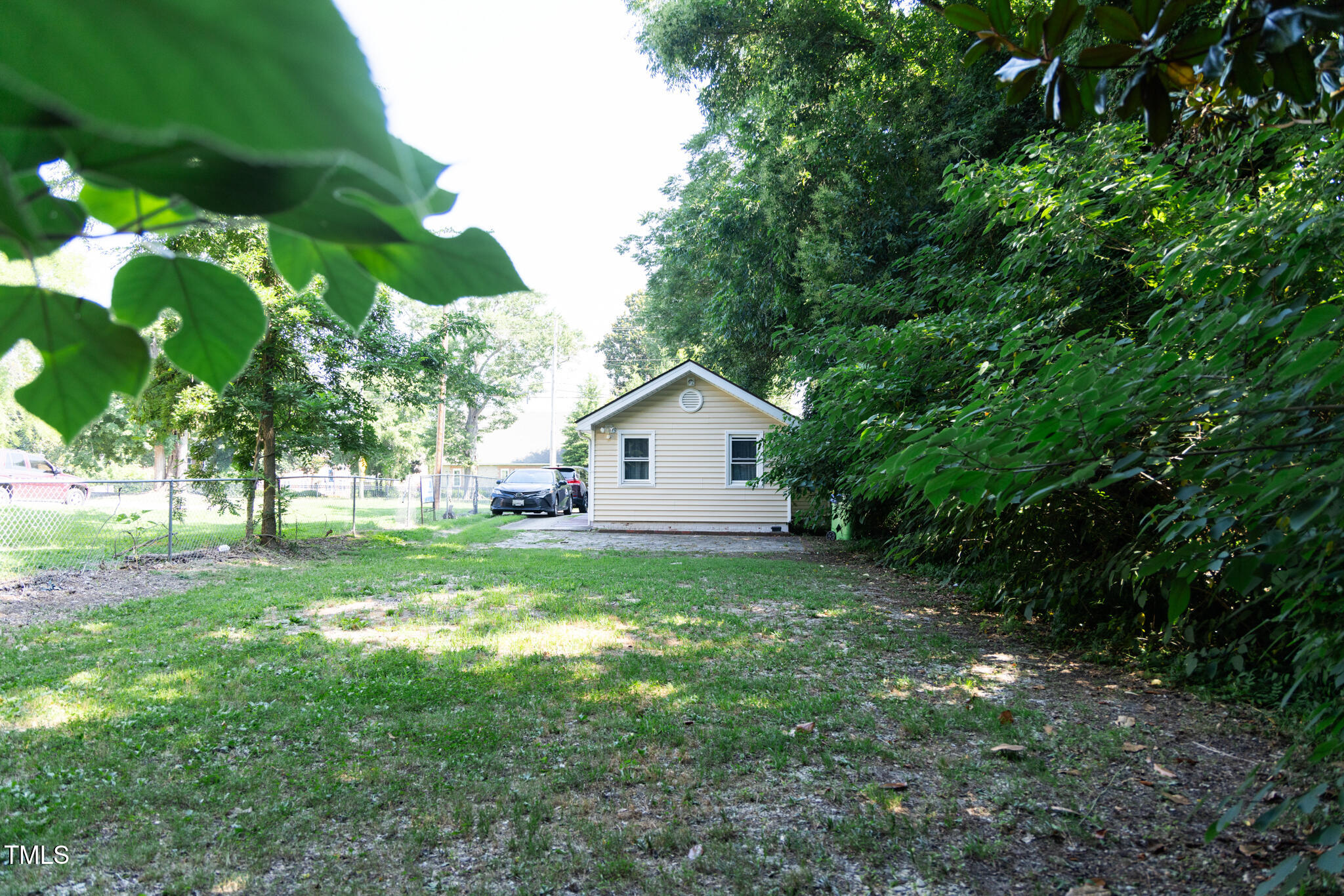 1320 Oakwood Avenue Raleigh, NC 27610 - Photo 6 of 6 a view of backyard of house with green space