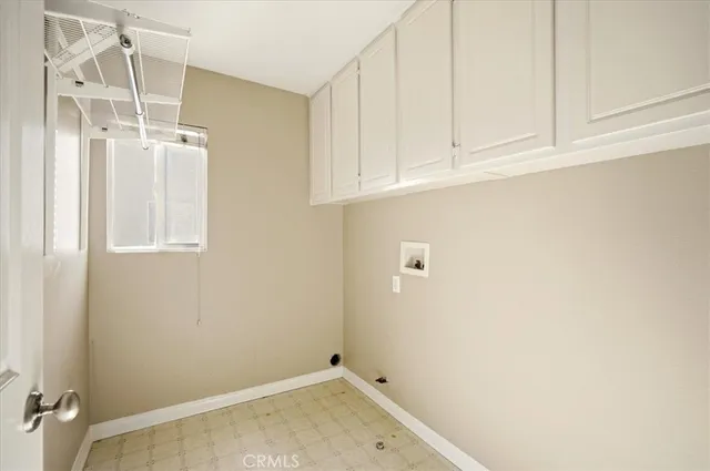 an empty room with cabinet