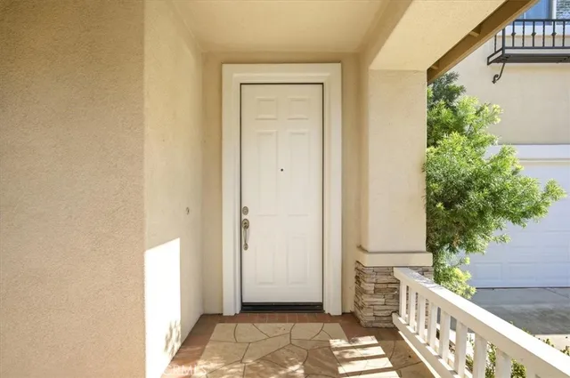 a view of a door and wooden floor