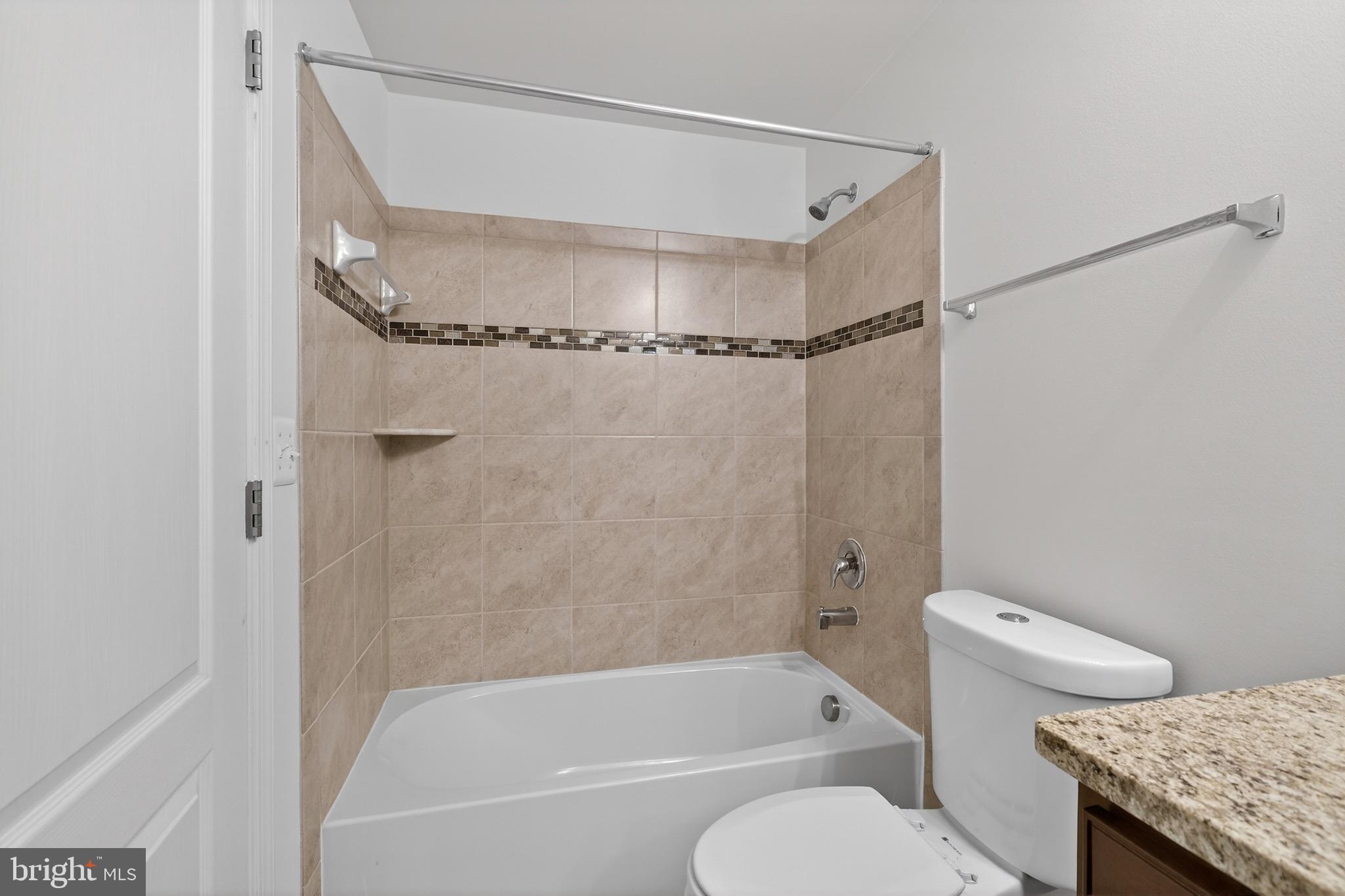 30045 Stage Coach Circle Milford, DE 19963 - Photo 57 of 72 Basement Full Bath w/ Tiled Tub Surround