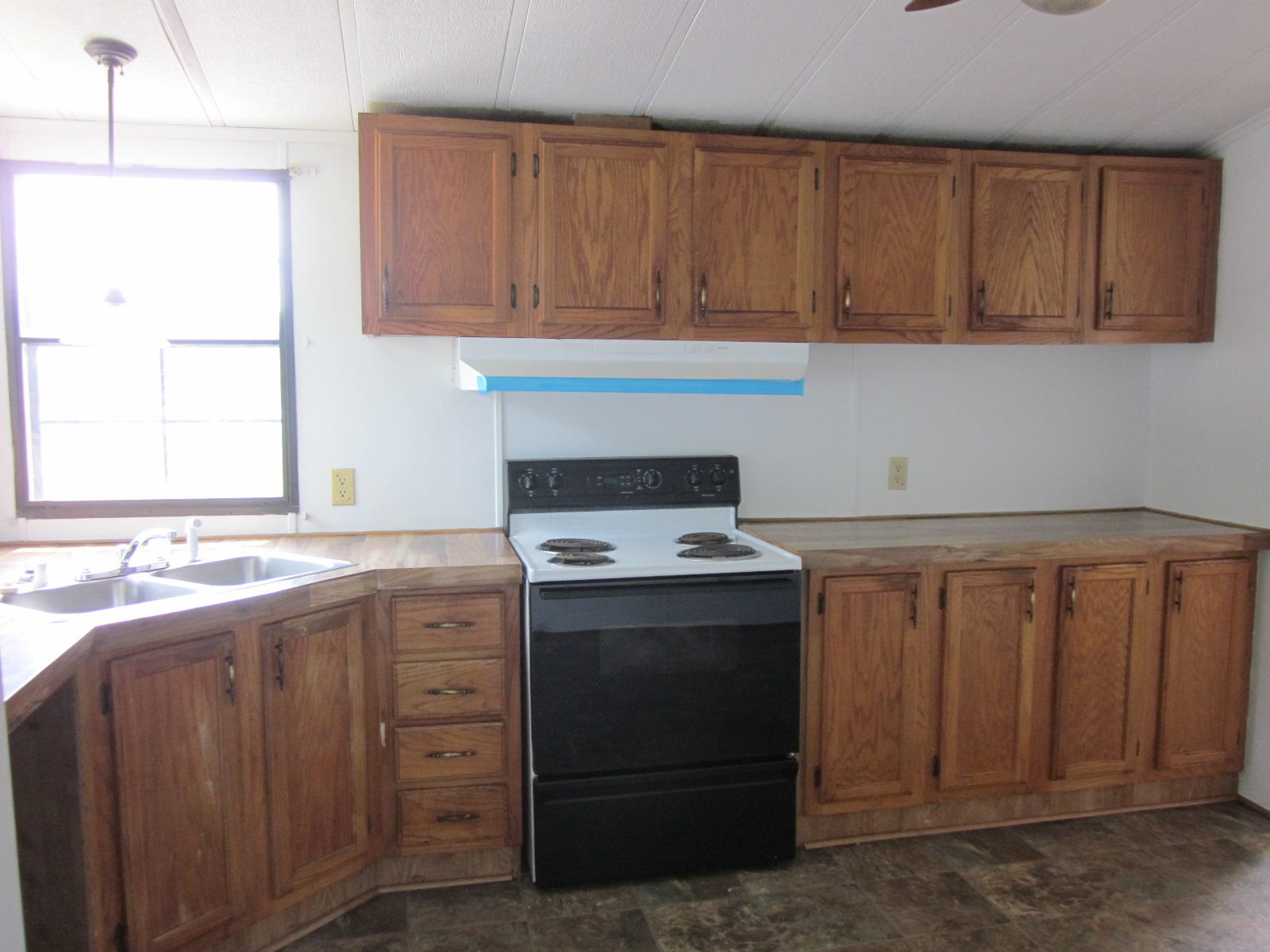 365 Ruritan Road Rocky Mount, VA 24151 - Photo 10 of 33 a kitchen with granite countertop a sink and a stove