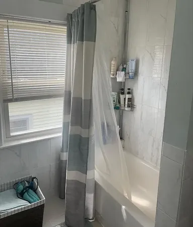 a bathroom with a bathtub