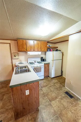a utility room with washer and dryer