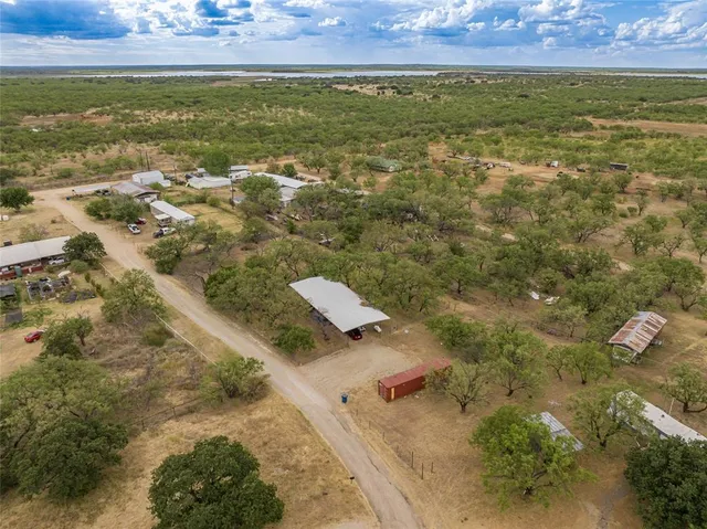 a view of a yard with an outdoor space