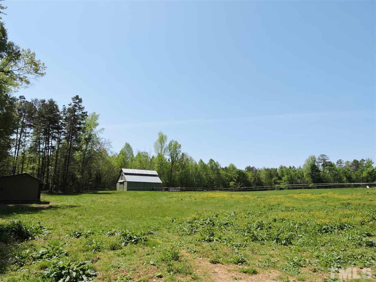 3337 Cates Mill Road Roxboro, NC 27574 - Photo 21 of 25 a view of a garden