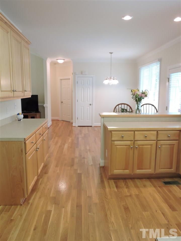 3337 Cates Mill Road Roxboro, NC 27574 - Photo 6 of 25 a kitchen with a sink a stove and cabinets