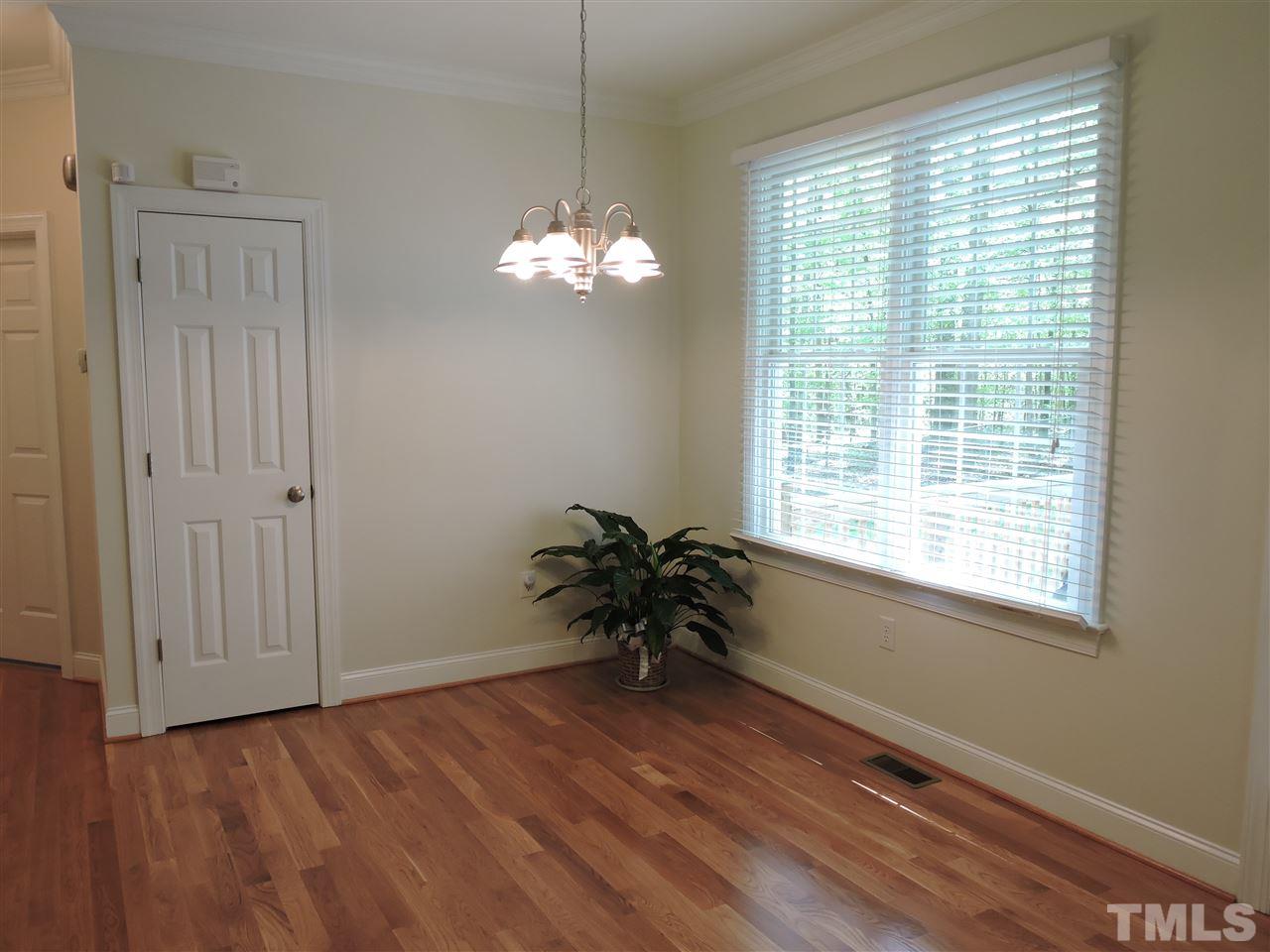 3337 Cates Mill Road Roxboro, NC 27574 - Photo 10 of 25 a view of a room with a window and wooden floor