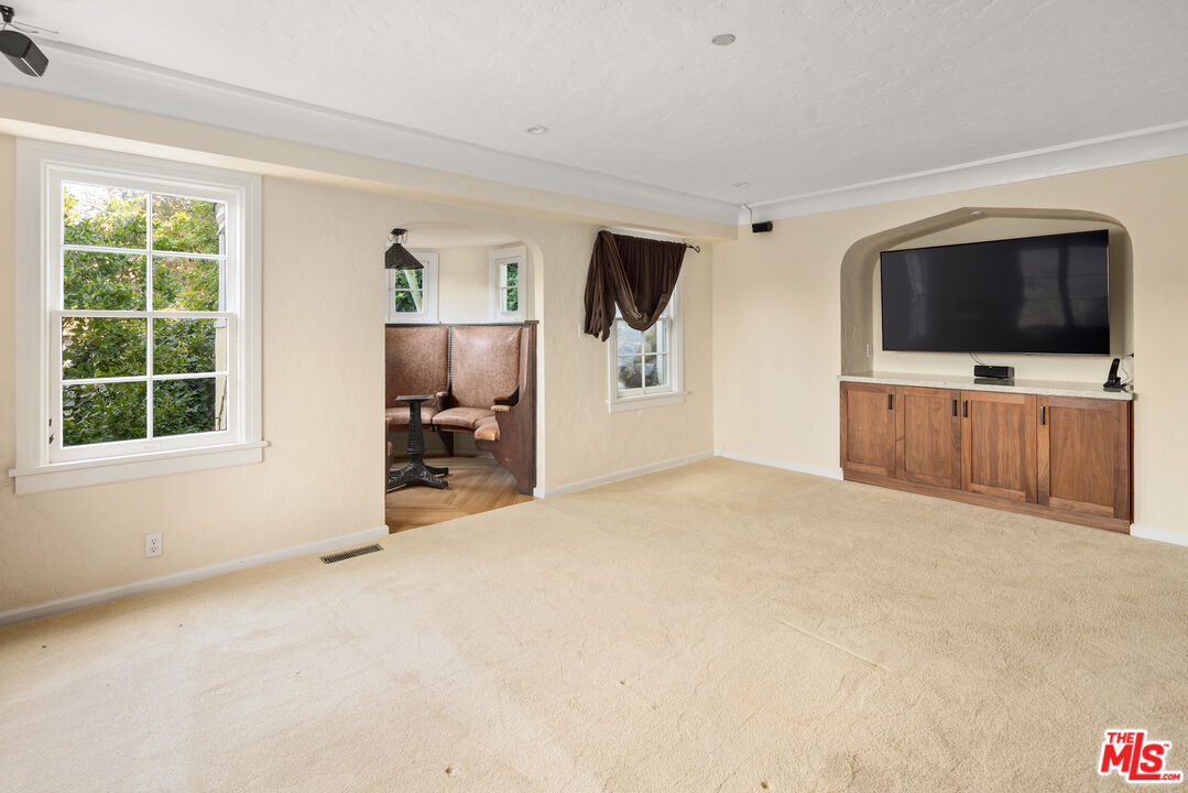 35 Haldeman Road Santa Monica, CA 90402 - Photo 8 of 18 a view of a livingroom with furniture and a flat screen tv