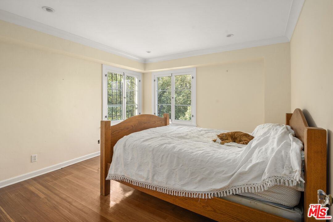 35 Haldeman Road Santa Monica, CA 90402 - Photo 10 of 18 a bed sitting in a bedroom next to a window