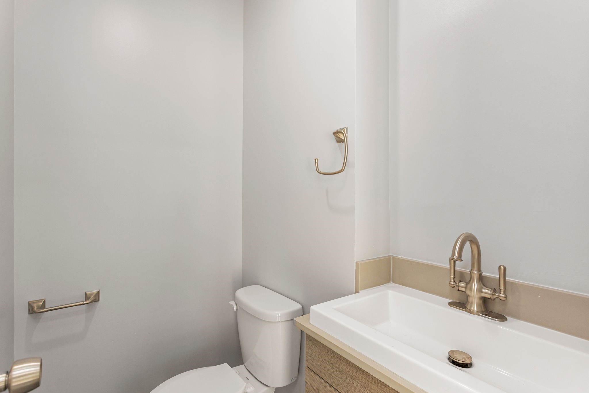 2005 Portsmouth Street, Unit C Houston, TX 77098 - Photo 16 of 26 a bathroom with a sink and a toilet
