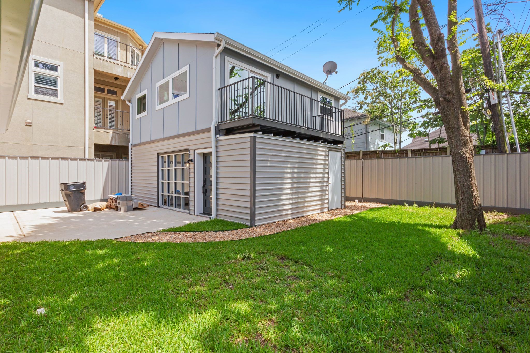 2005 Portsmouth Street, Unit C Houston, TX 77098 - Photo 25 of 26 a view of backyard of house with green space