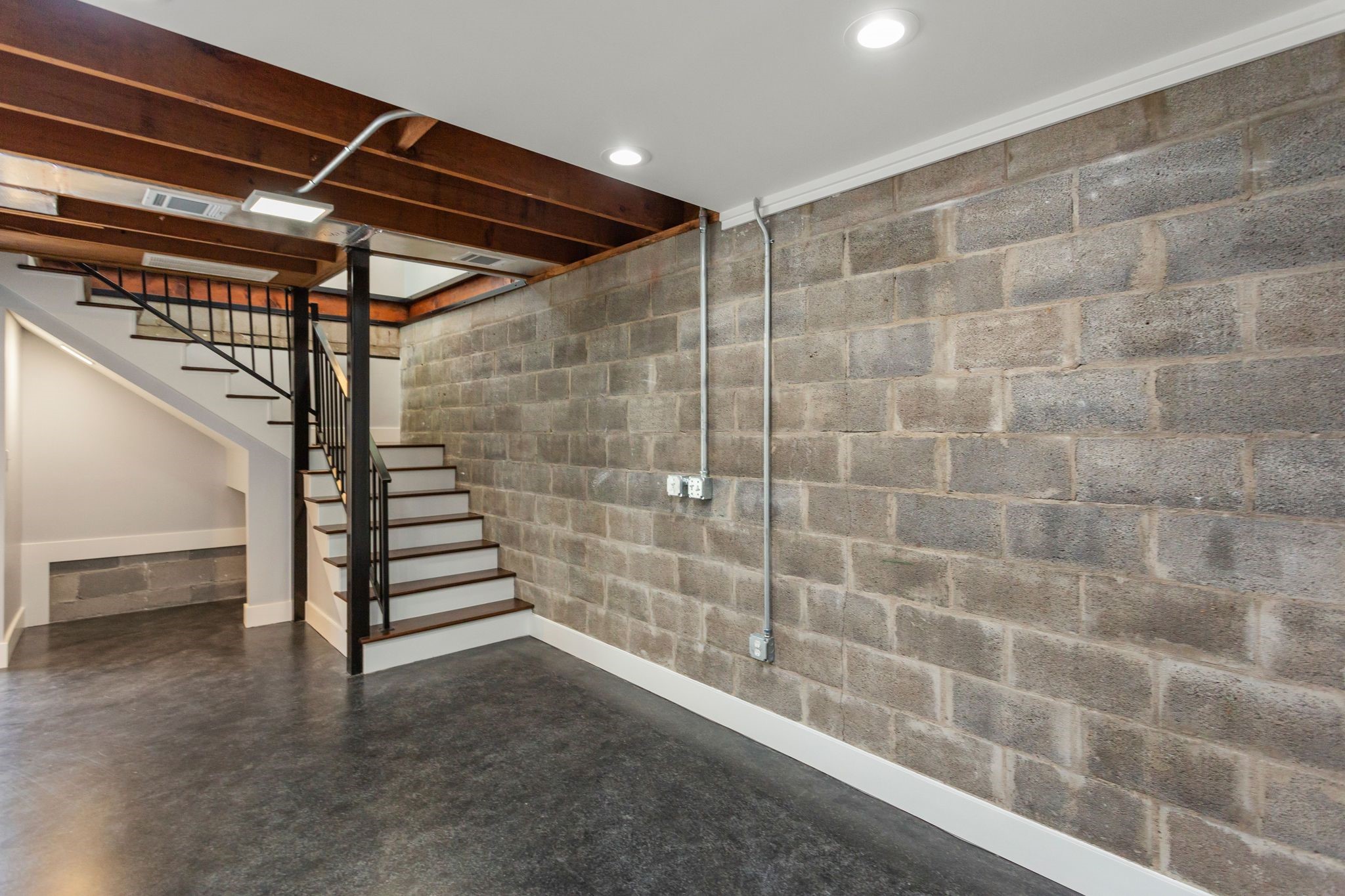 2005 Portsmouth Street, Unit C Houston, TX 77098 - Photo 4 of 26 a view of a room with racks on the wall