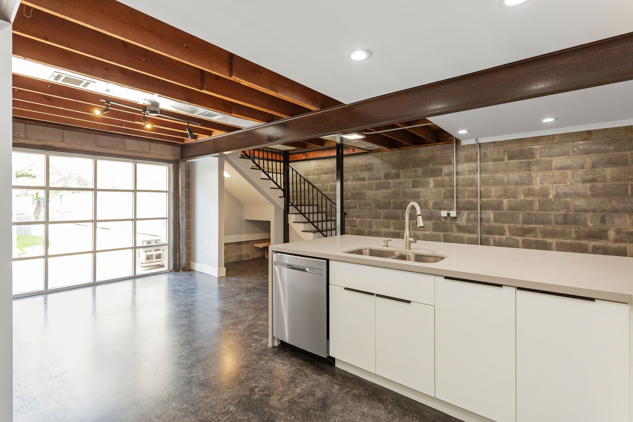 2005 Portsmouth Street, Unit C Houston, TX 77098 - Photo 10 of 26 a kitchen with sink and cabinets