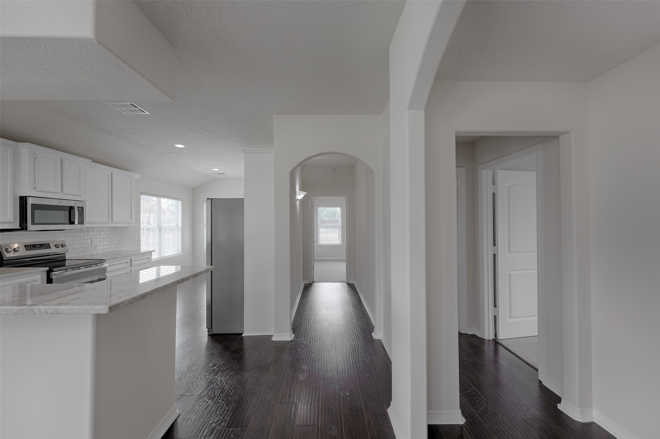 14605 Ophiuchus Court Willis, TX 77318 - Photo 15 of 37 Hall leads to primary retreat.