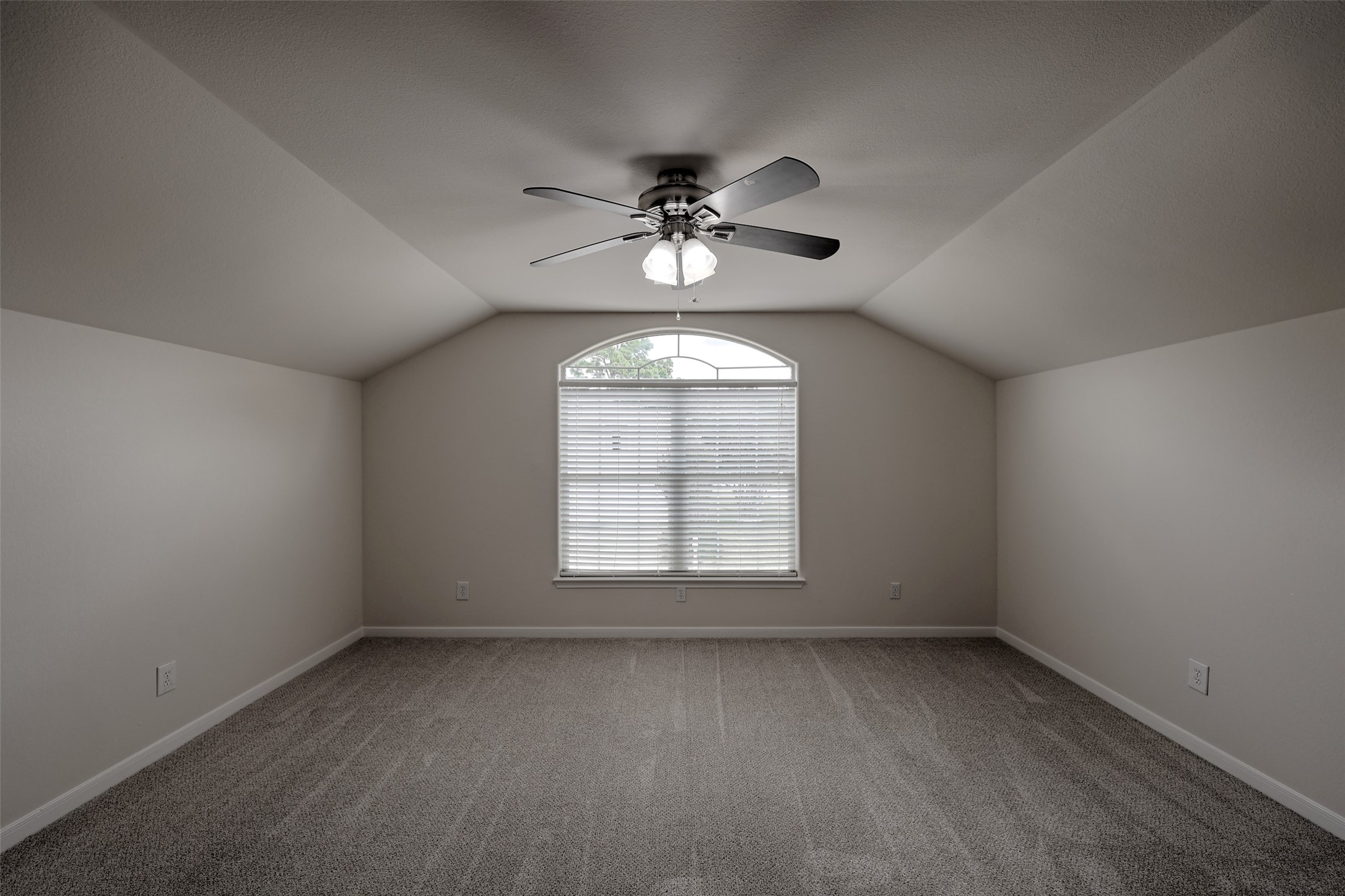 14605 Ophiuchus Court Willis, TX 77318 - Photo 27 of 37 Upstairs room makes a great bedroom or gameroom! Situated over the garage for maximum serenity.