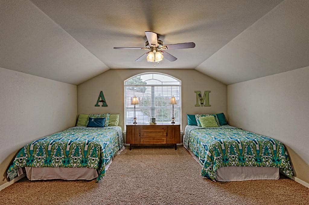 14605 Ophiuchus Court Willis, TX 77318 - Photo 28 of 37 View of upstairs bedroom with TWO FULL size beds!