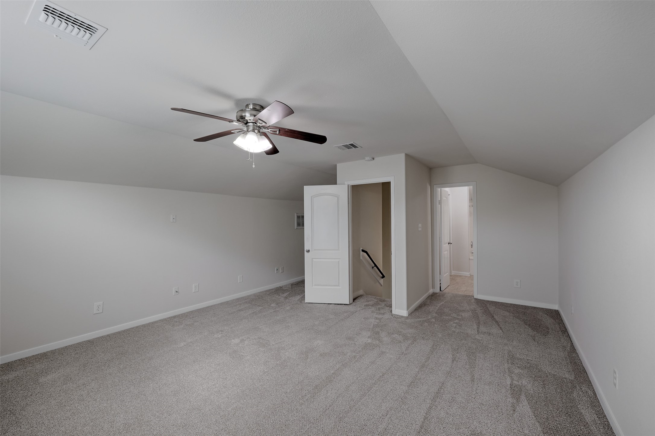 14605 Ophiuchus Court Willis, TX 77318 - Photo 29 of 37 Upstairs bedroom and full bathroom.