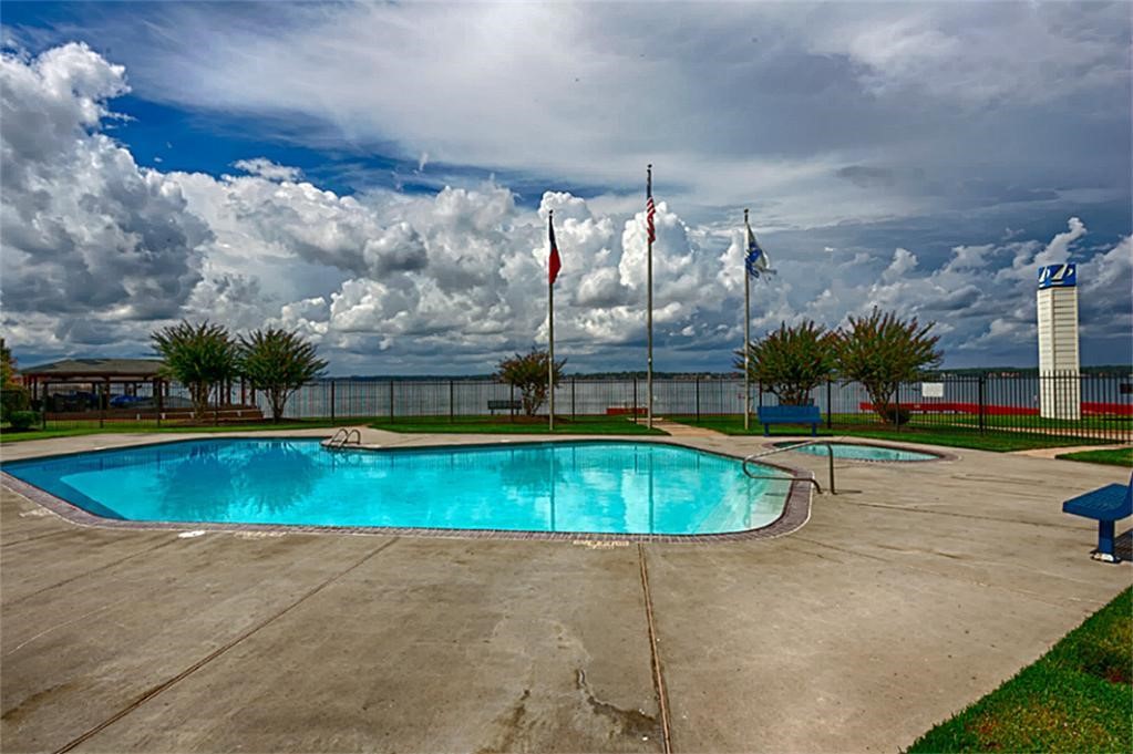 14605 Ophiuchus Court Willis, TX 77318 - Photo 35 of 37 Point Aquarius pool overlooks Lake Conroe.