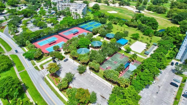 a view of a swimming pool with a yard