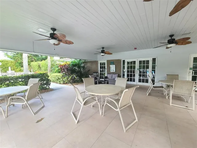 a city view with tall trees