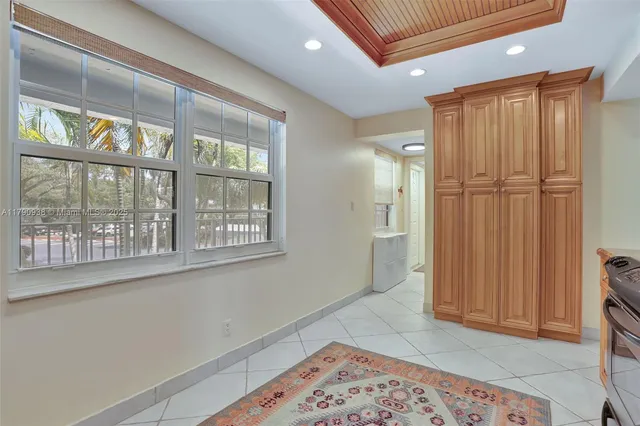 a kitchen with stainless steel appliances granite countertop a stove and a refrigerator