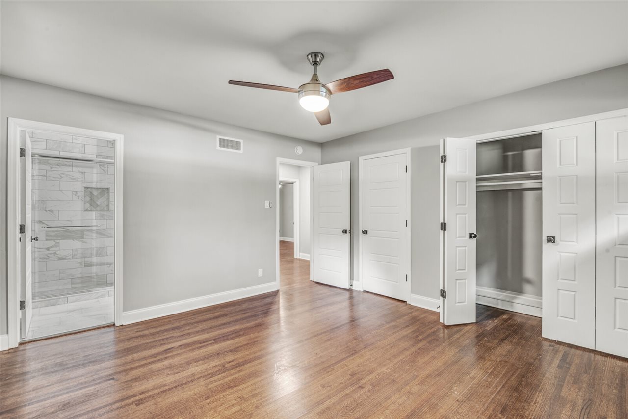 5209 South Angela Road Memphis, TN 38117 - Photo 14 of 25 This second master is a large room with double closets and a full attached bathroom.