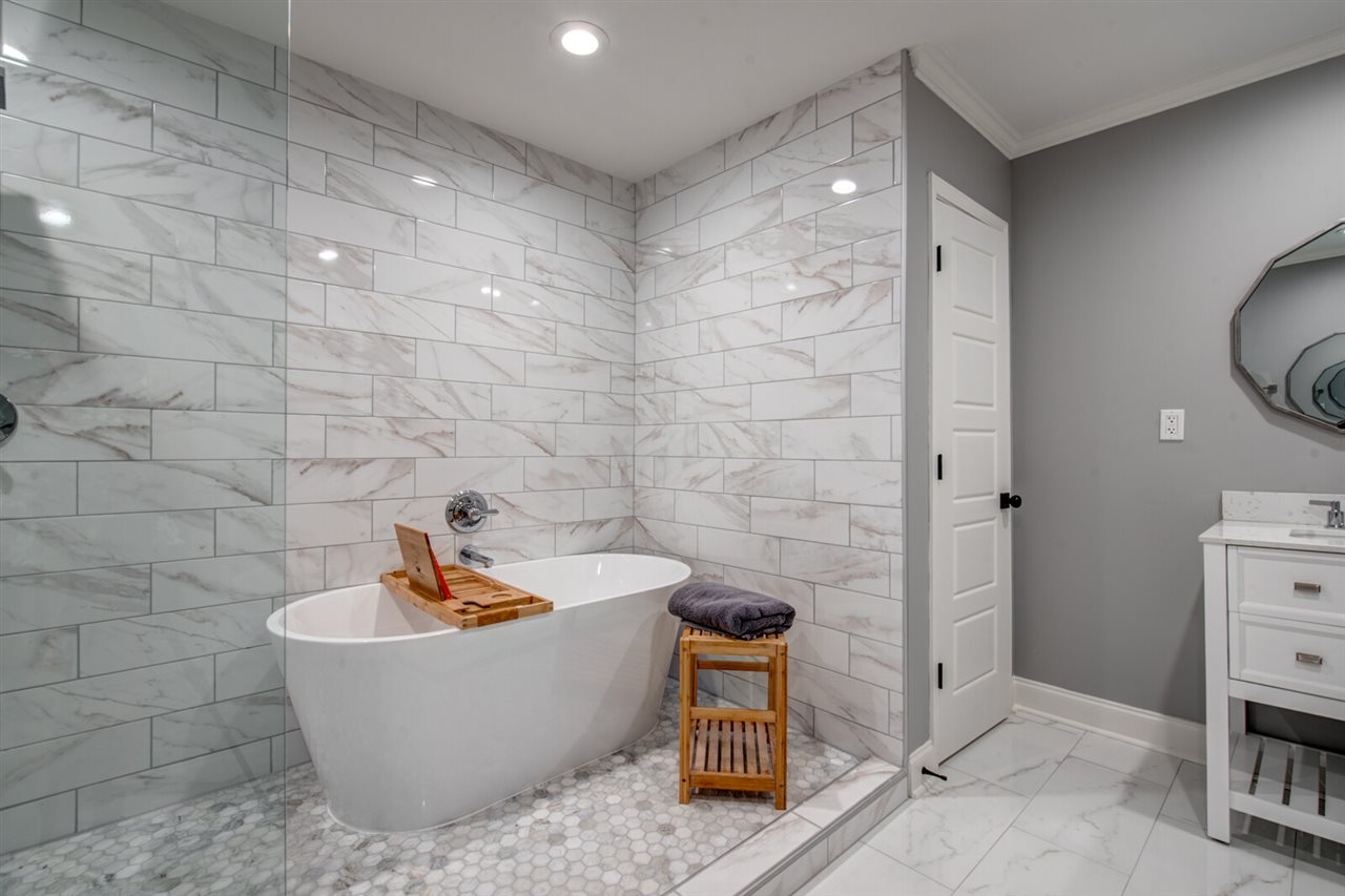 5209 South Angela Road Memphis, TN 38117 - Photo 22 of 25 Second view of the master bath and that door leads to a private toilet closet
