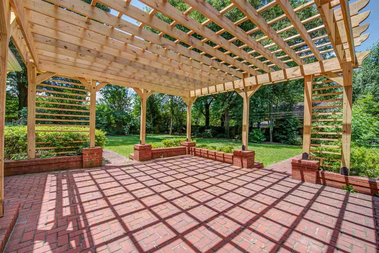 5209 South Angela Road Memphis, TN 38117 - Photo 25 of 25 Large brick patio with new pergola waiting for your special touch.