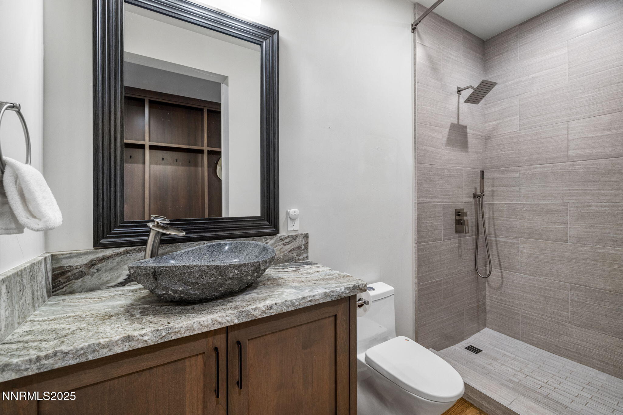 2255 Warrior Lane Reno, NV 89523 - Photo 20 of 52 a bathroom with a granite countertop sink toilet and shower
