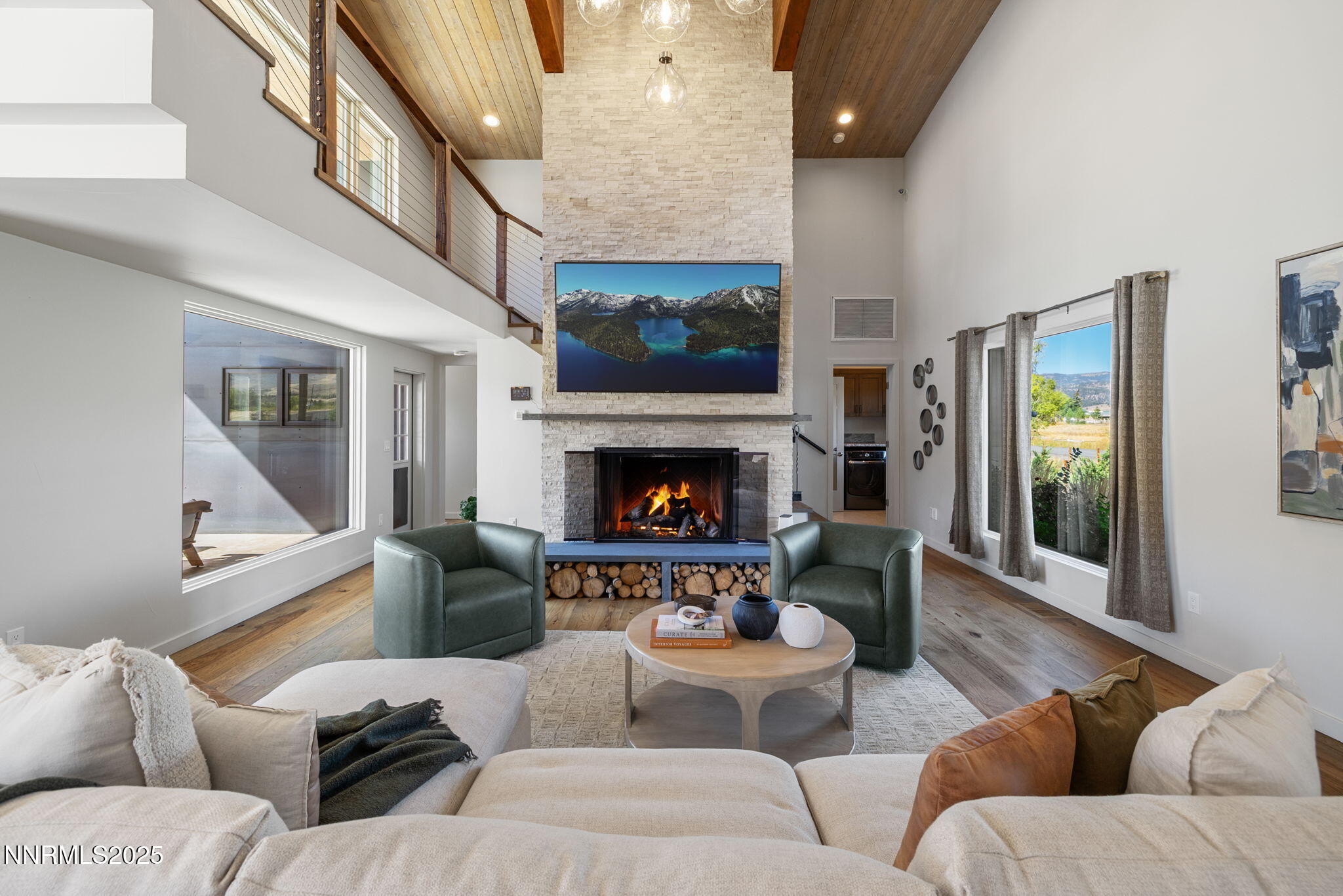 2255 Warrior Lane Reno, NV 89523 - Photo 2 of 52 a living room with furniture and a fireplace