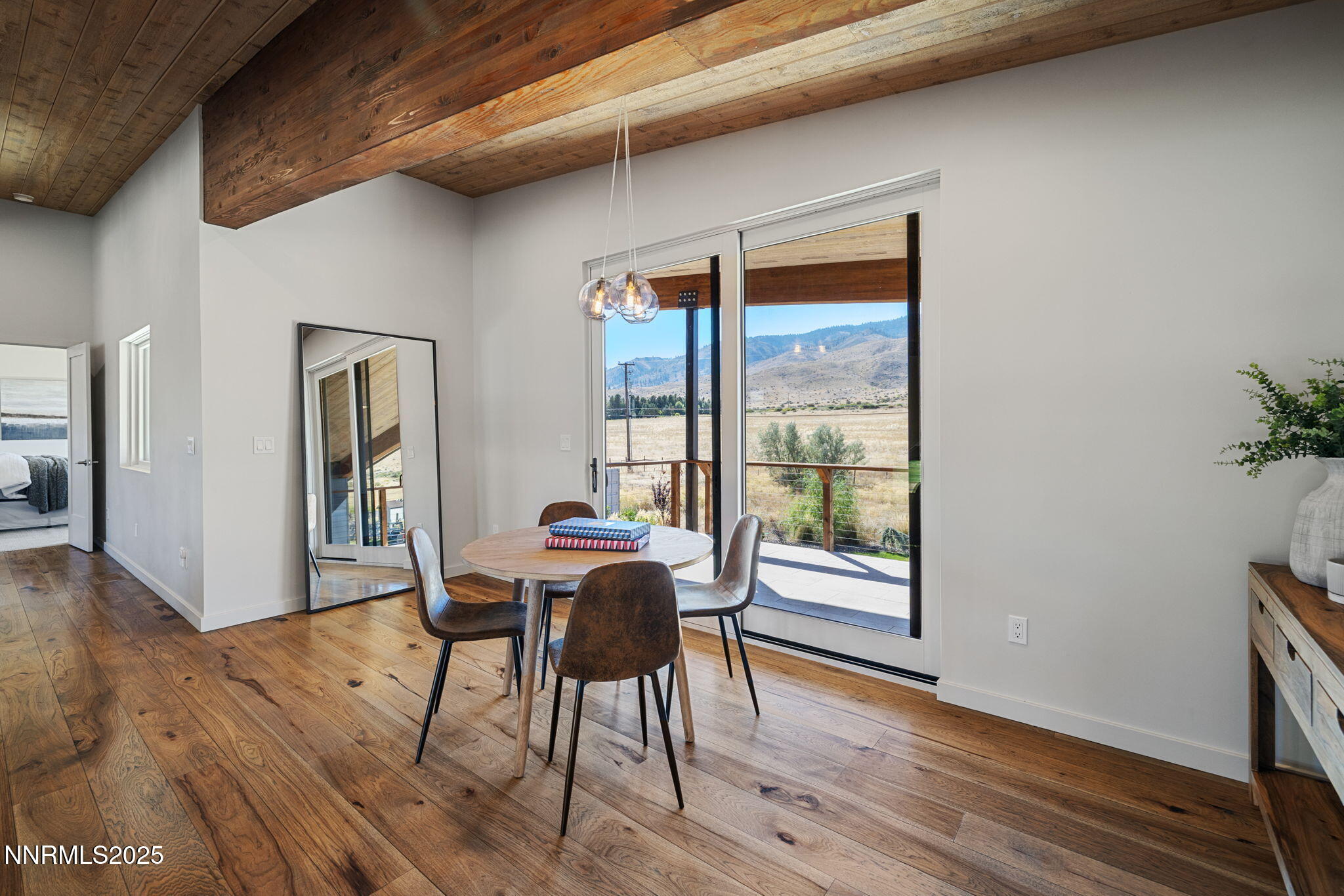 2255 Warrior Lane Reno, NV 89523 - Photo 22 of 52 a workspace with wooden floor and furniture
