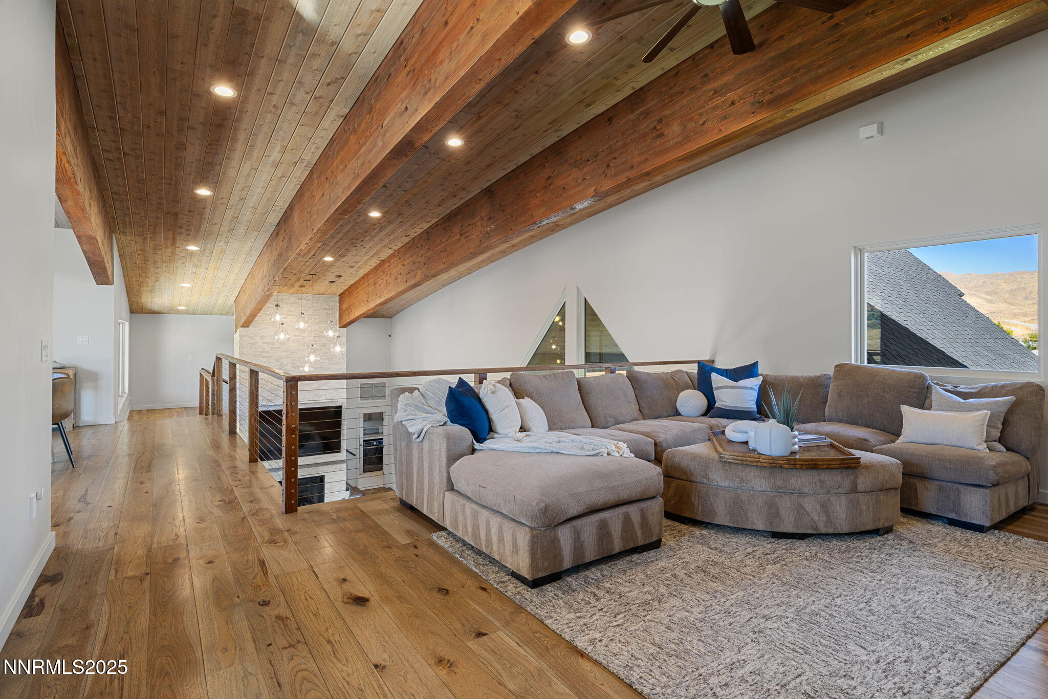 2255 Warrior Lane Reno, NV 89523 - Photo 25 of 52 a living room with furniture and a wooden floor