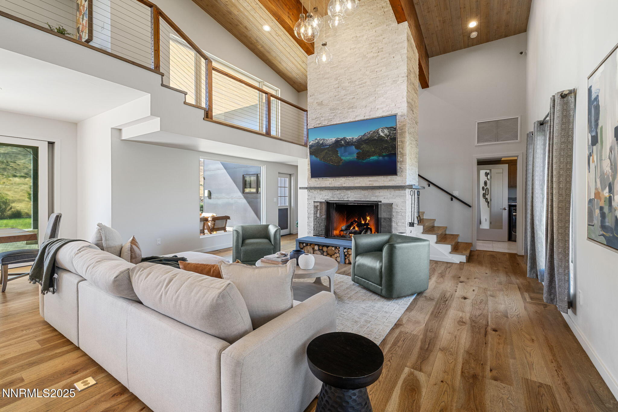 2255 Warrior Lane Reno, NV 89523 - Photo 3 of 52 a living room with furniture and a fireplace