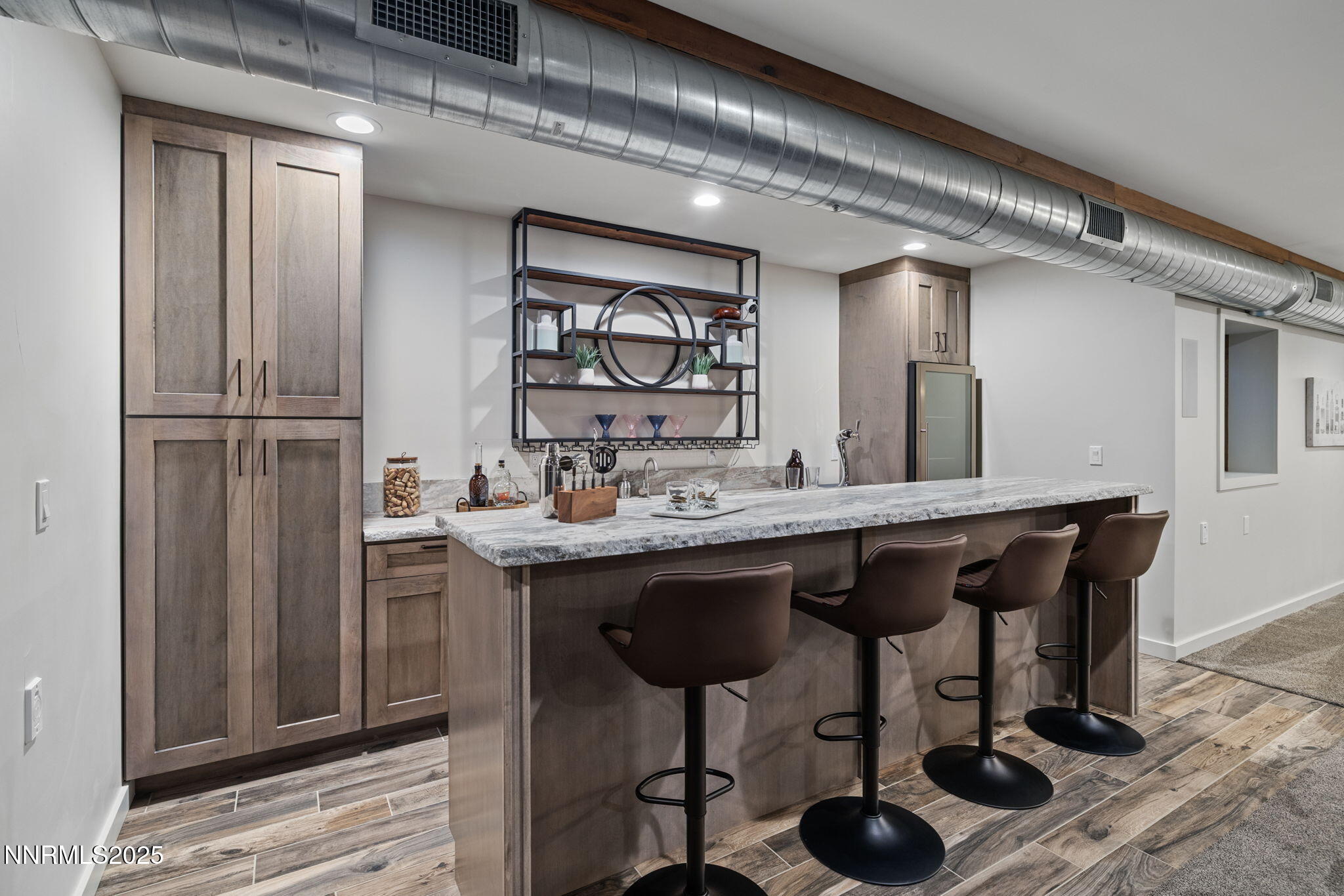 2255 Warrior Lane Reno, NV 89523 - Photo 34 of 52 a kitchen with a sink cabinets and dining table chair