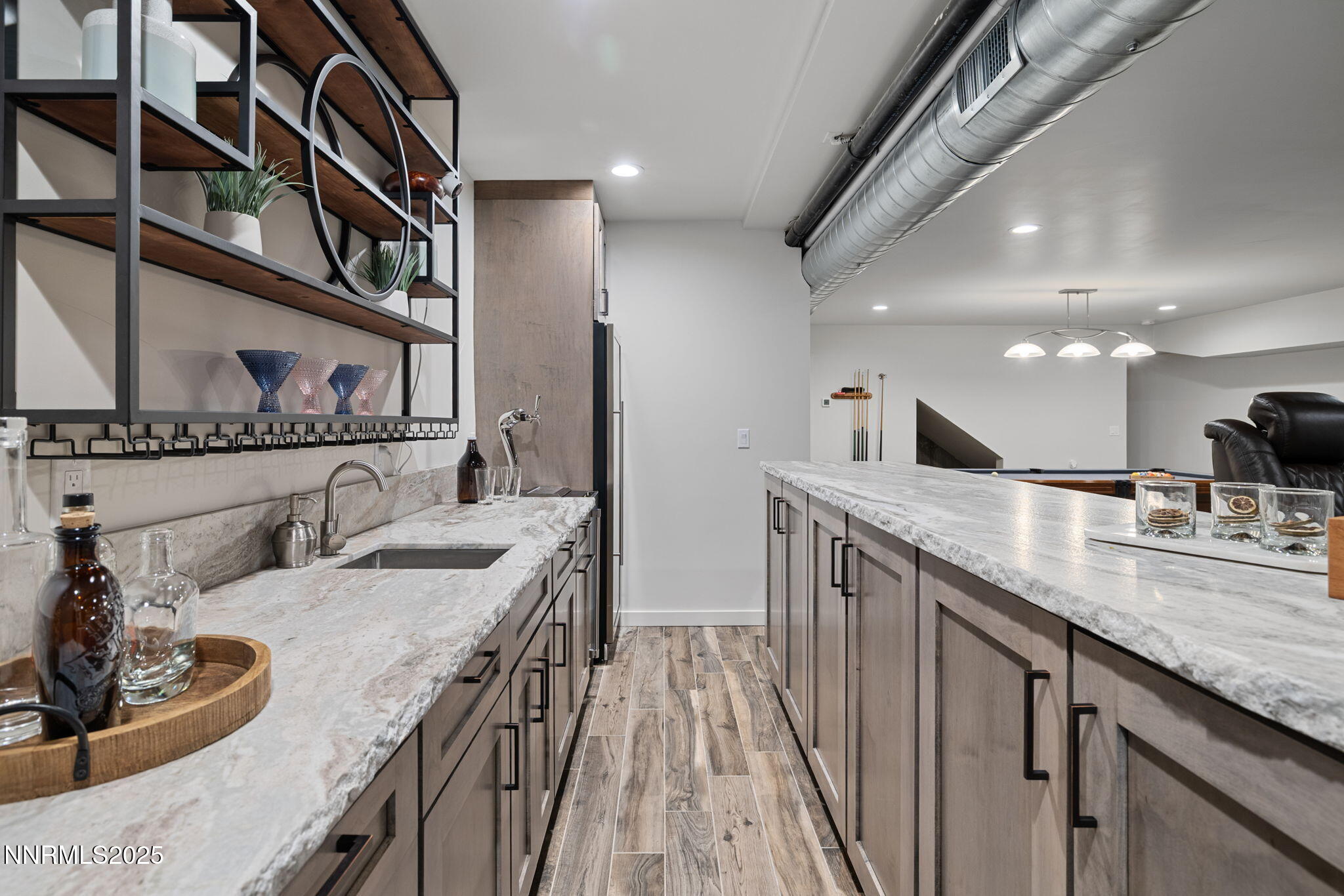2255 Warrior Lane Reno, NV 89523 - Photo 35 of 52 a kitchen with counter space a sink and cabinets